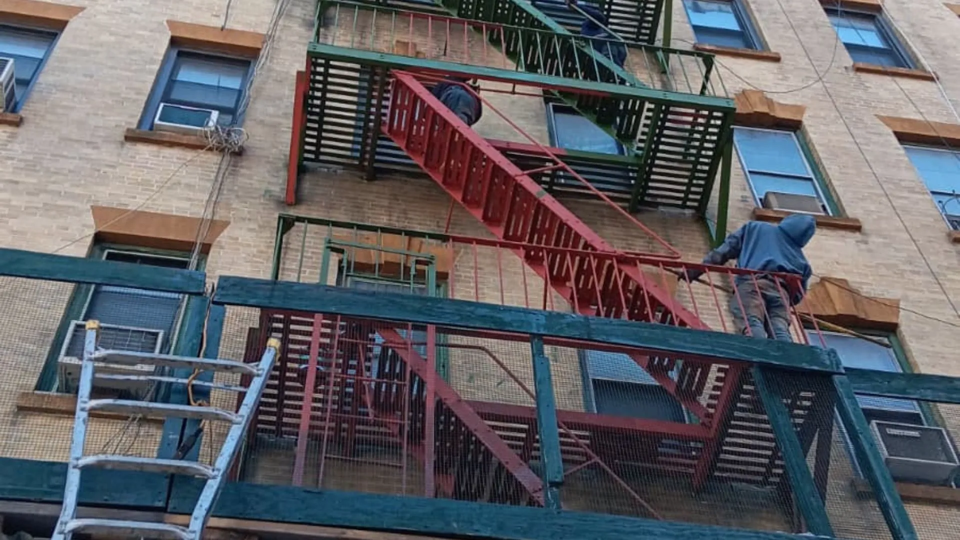 Property owner reviewing compliance documents
